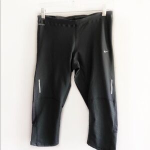 Nike Dri-Fit gray legging with mesh on the bottom